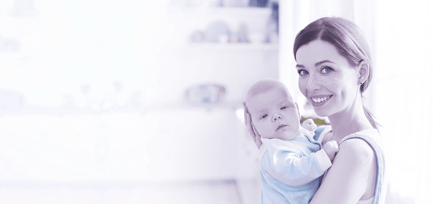 A mother holding her baby